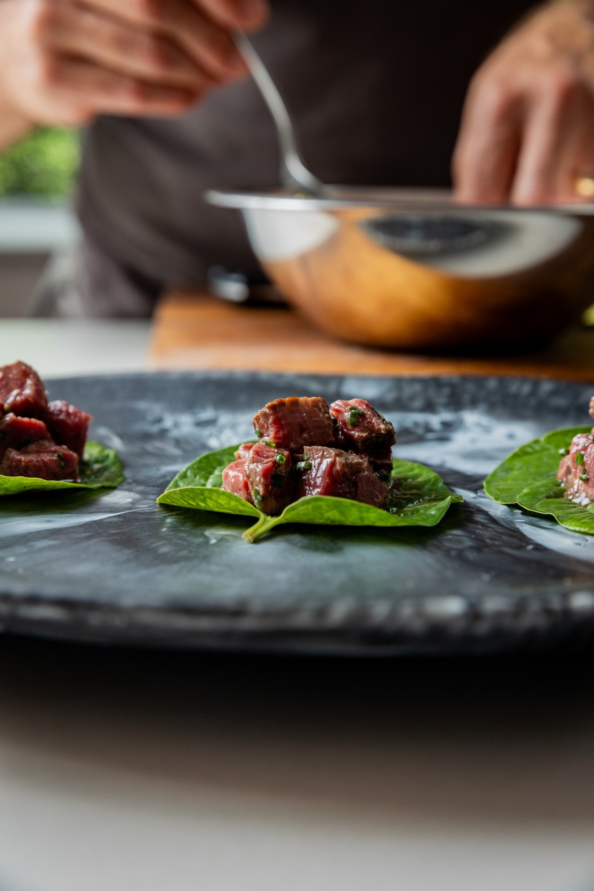 Chef Ian Oakes plating on the Providore Global shoot in Byron Bay.